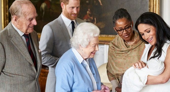 Prince Harry and Meghan Markle with the son