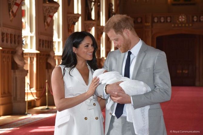 Prince Harry and Meghan Markle with the son