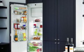Обновляем кухню: как подобрать встраиваемый холодильник к интерьеру?