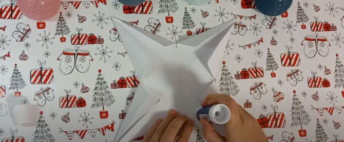 Як зробити об’ємну зірку з паперу своїми руками 9