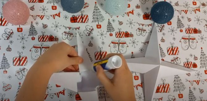 Як зробити об’ємну зірку з паперу своїми руками 13