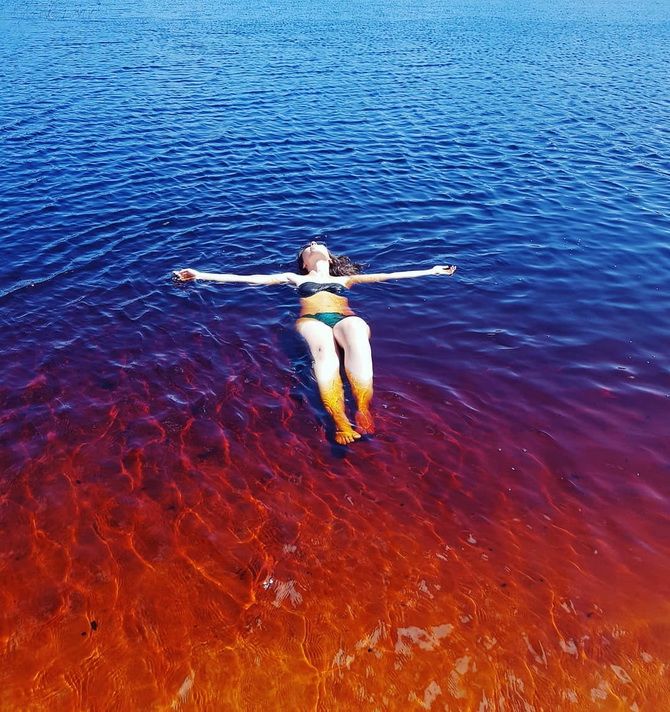 Coca-Cola lake in Brazil with cola-colored water 9