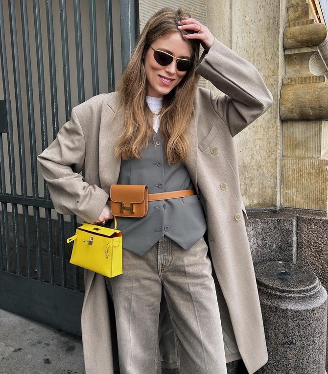 Free Photo | Stylish beautiful woman wearing blue scarf with yellow handbag.  fashion model