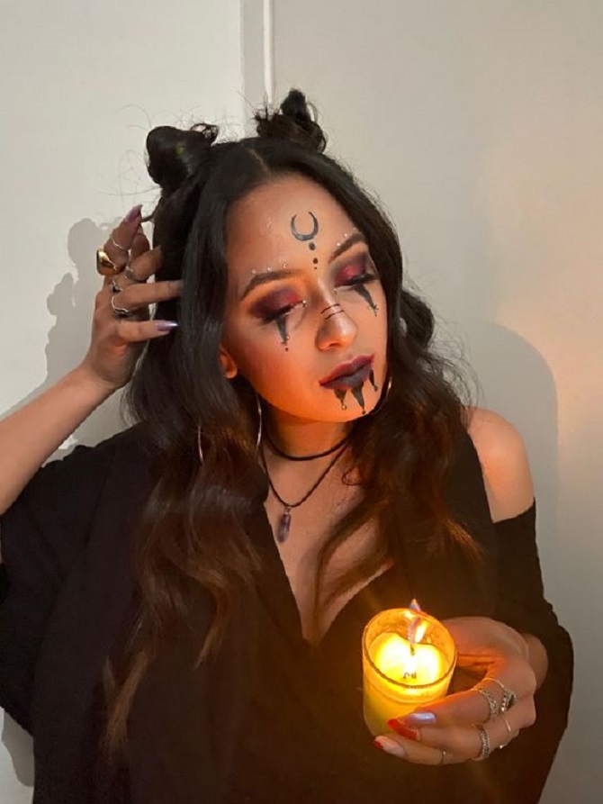 The image of a witch for Halloween: photo ideas for makeup and costumes 10