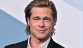 Brad Pitt at the concert lit up with a new girl