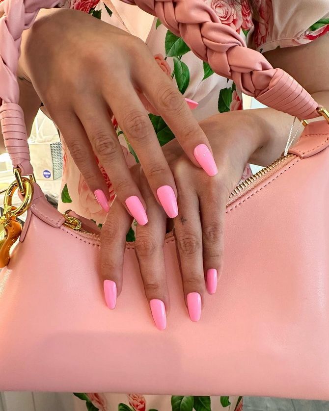 Like a Barbie: fashionable pink manicure in the style of Barbiecore 9