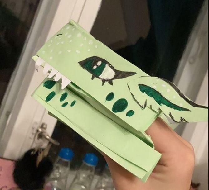 TikTok trends: how to make a paper dragon on your hand (+ bonus video) 11