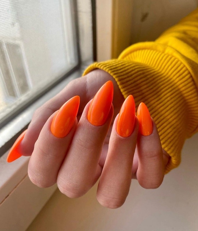 Leuchtend orangefarbene Maniküre: modische Ideen für stilvolles Nageldesign 3