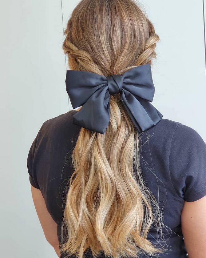 Charming hairstyles with a bow: romance and style in one accessory 20