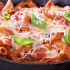 Baked pasta with mushrooms and tomatoes: how to cook a delicious dish